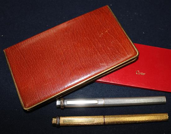 Two Must de Cartier pens and an Orlik of Old Bond Street leather cigarette case